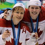 Jayna Hefford (16) and Gillian Apps (10) celebrating their gold medal win